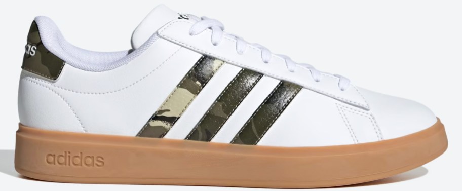 white adidas sneaker with camo print stripes