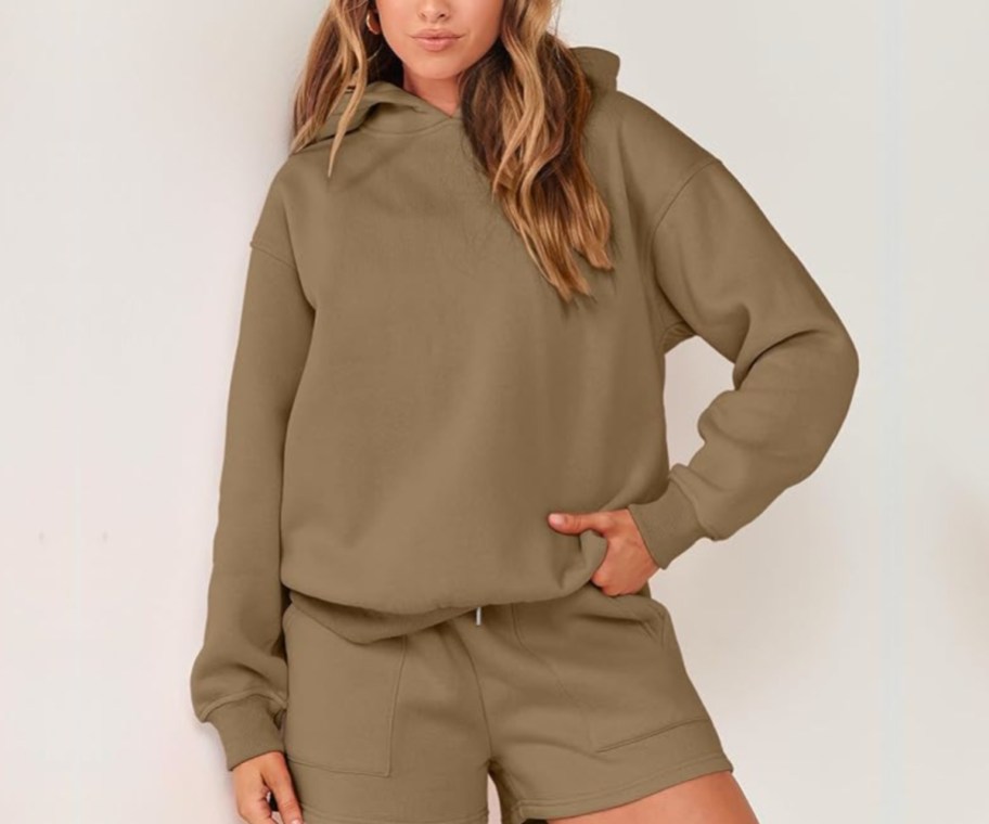 woman in brown hoodie and shorts