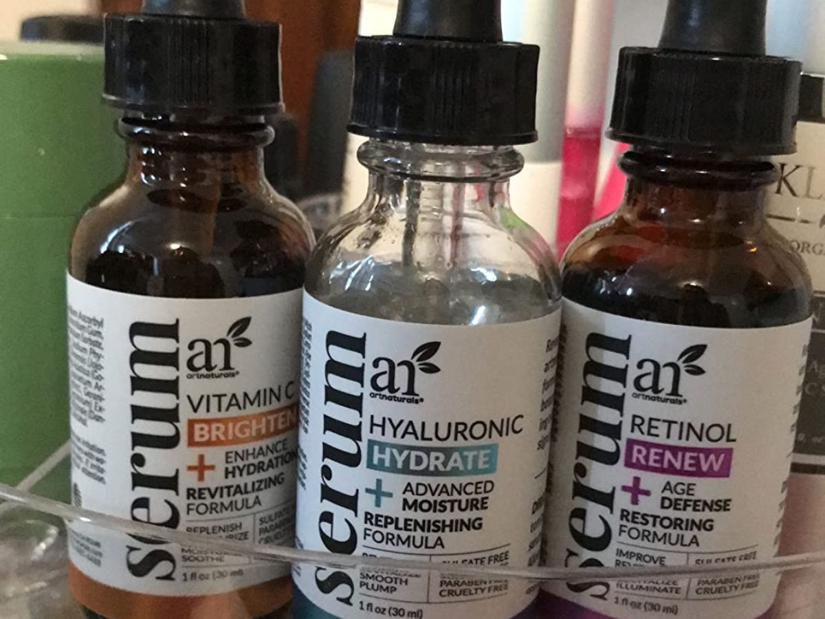Close up of 3 bottles of artnaturals face serums