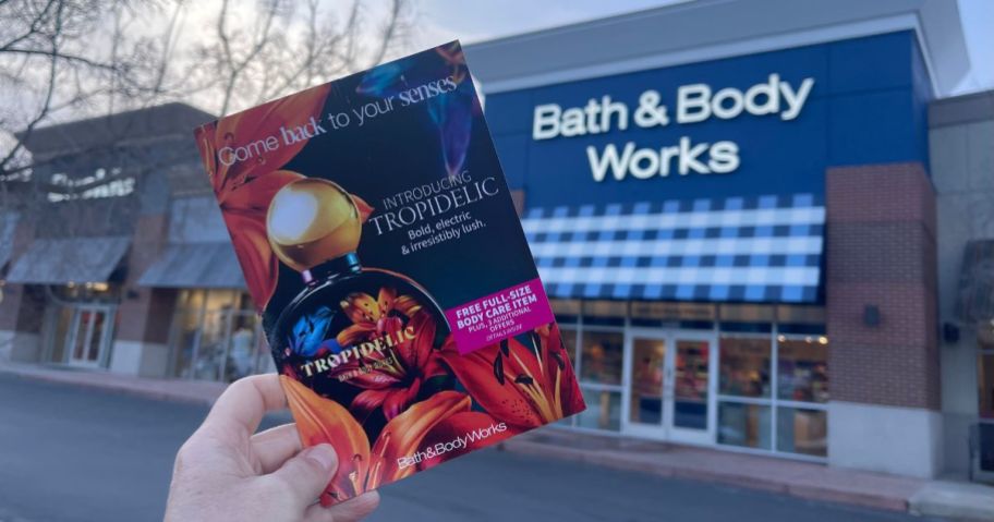 A hand holding a Bath & Body Works Mailer Coupons 