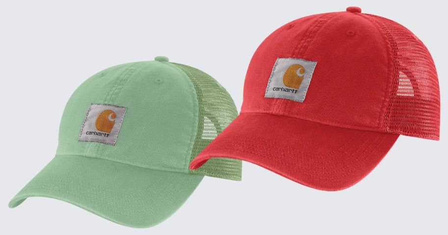a green and a reddish orange mesh back Carhartt hat