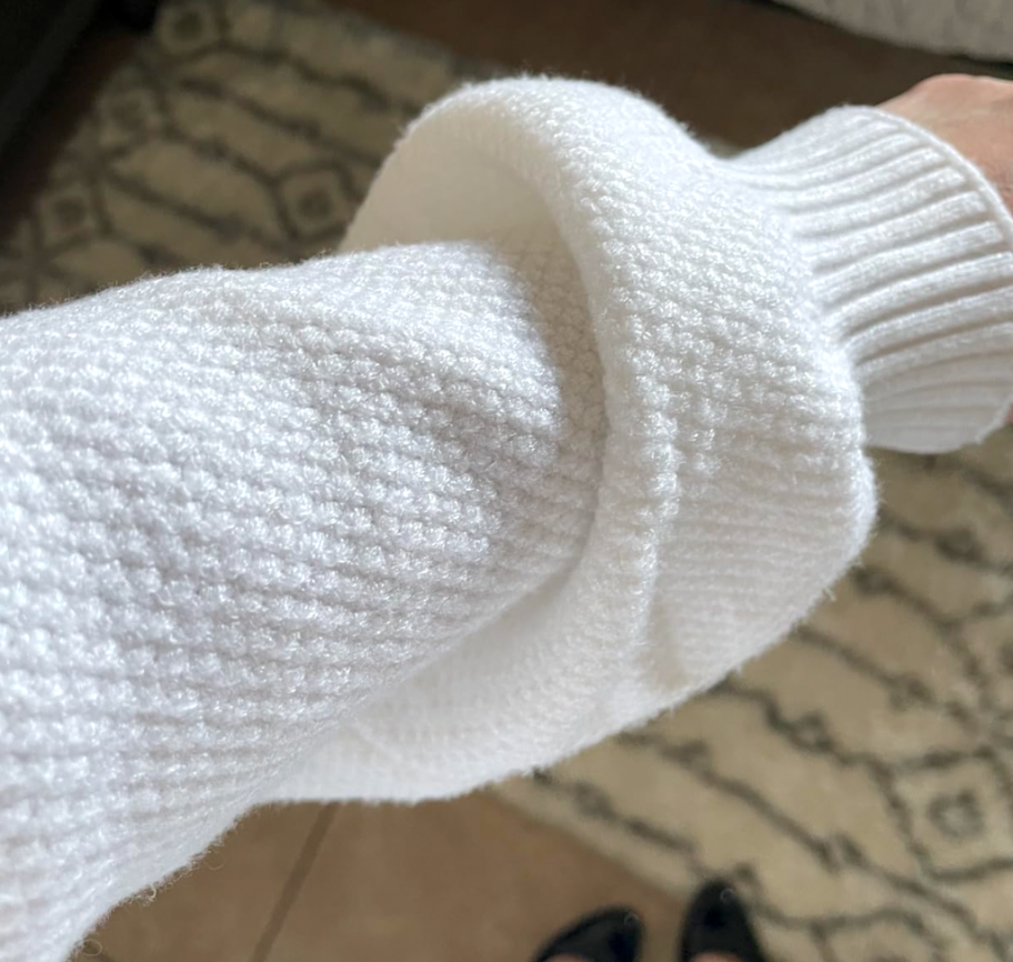 close up of white sweater 