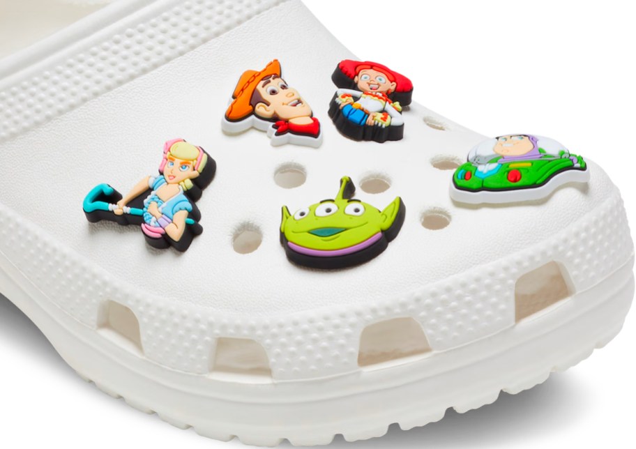 crocs toy story charms alien, woody, buzz light year and more on white crocs