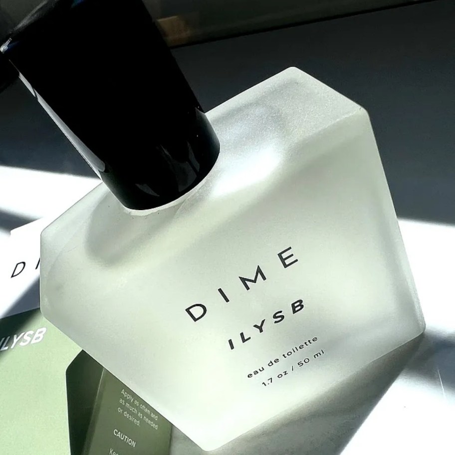 a bottle of dime beauty i love your smell baby perfume