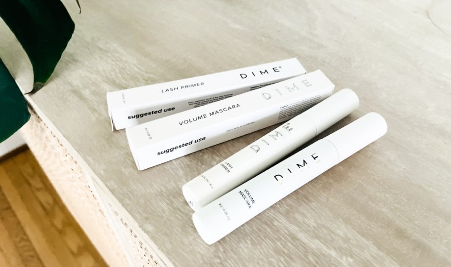 dime beauty lash primer and mascara on a countertop
