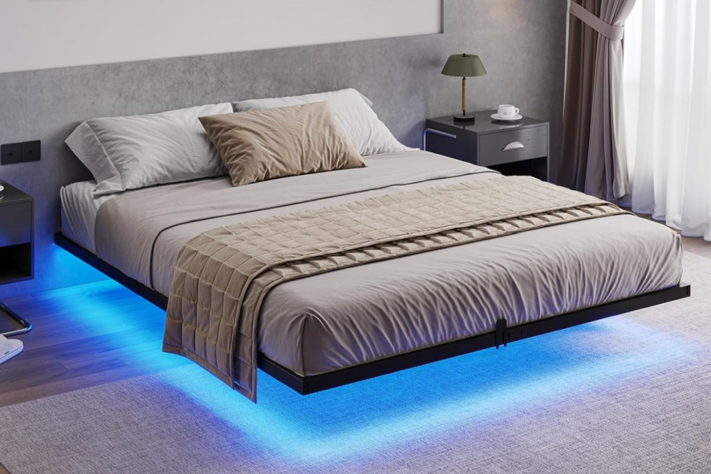 floating queen bed with blue LED lights undermeath