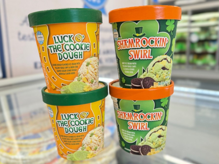 four tubs of ice cream in two different flavors