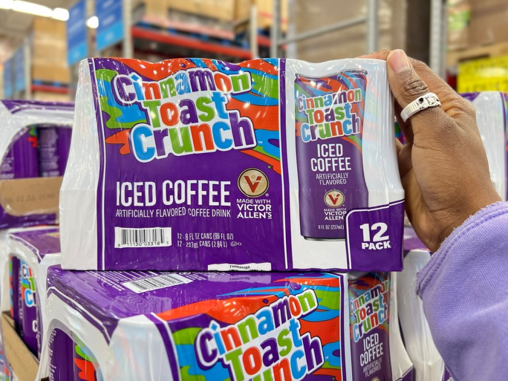 hand holding Cinnamon Toast Crunch coffee pack in hand at the store