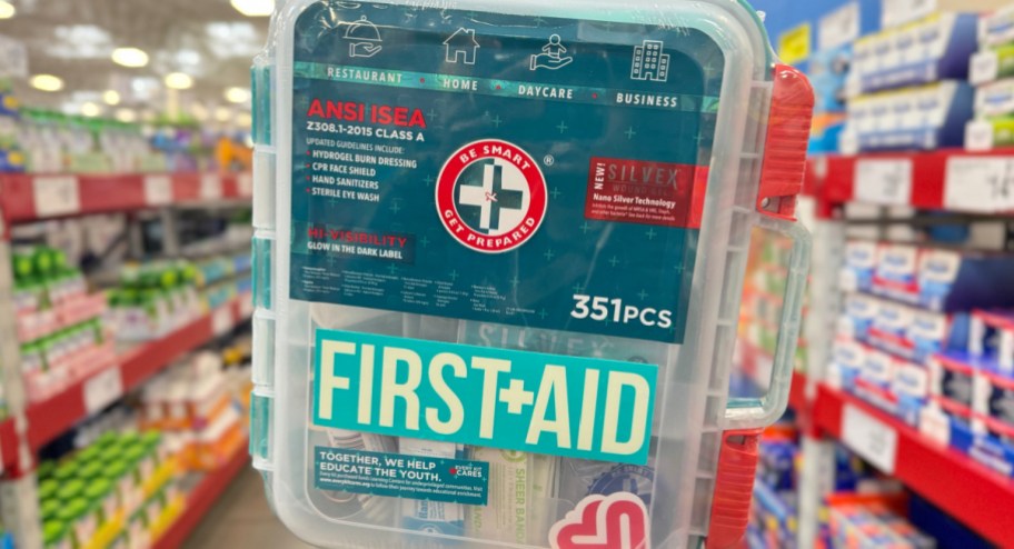 hand holding first aid kit with 351 pieces at the sams club store