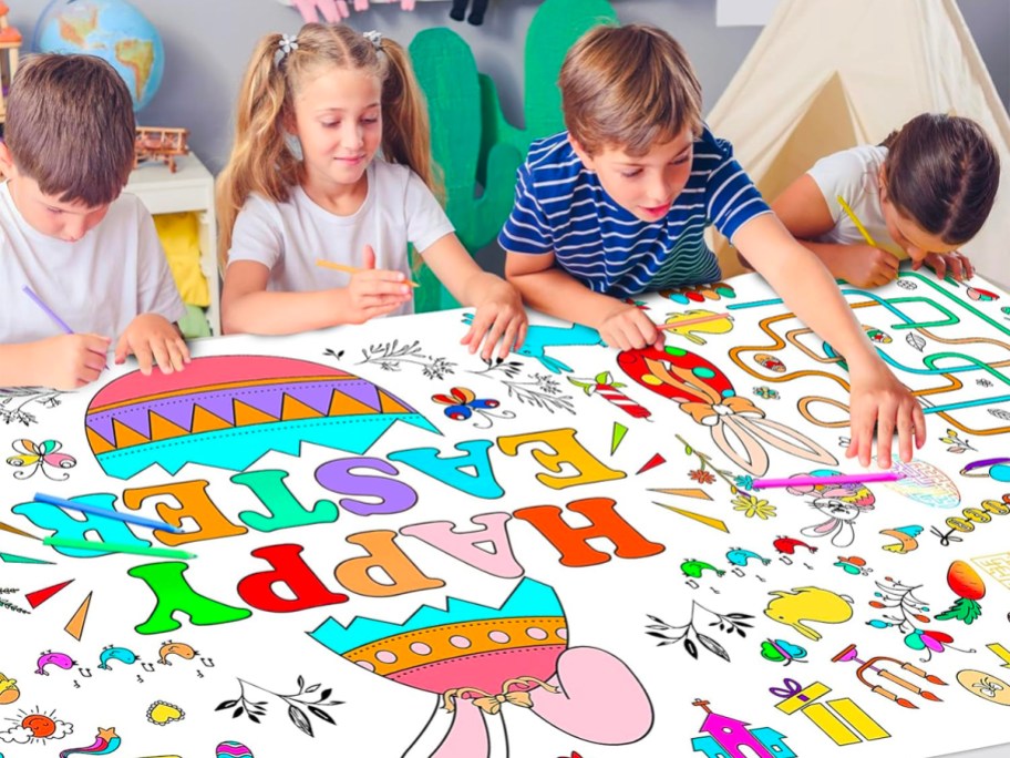 4 kids coloring on giant easter tablecloth