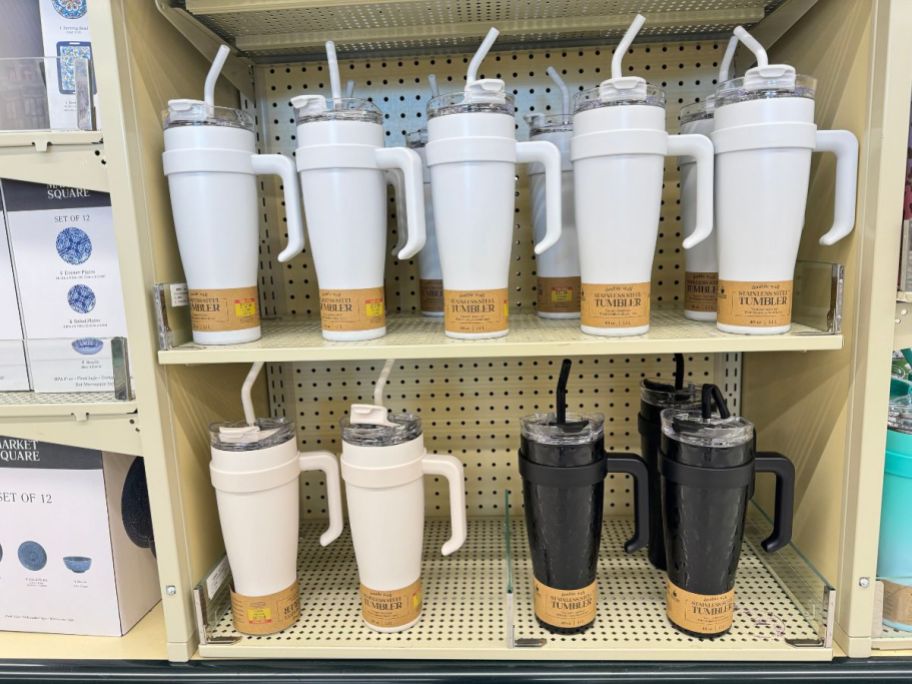 white, cream color and black 40 oz stainless steel straw tumblers at Hobby Lobby