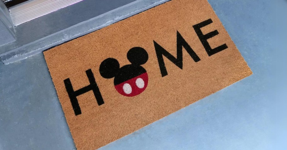 coir doormat with "Home" and the O is Mickey Mouse