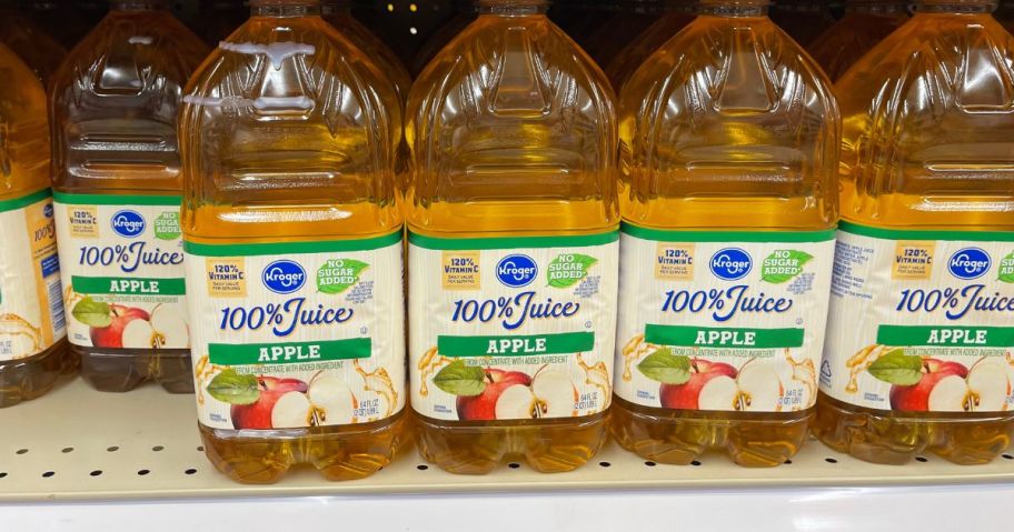 bottles of kroger apple juice on shelf