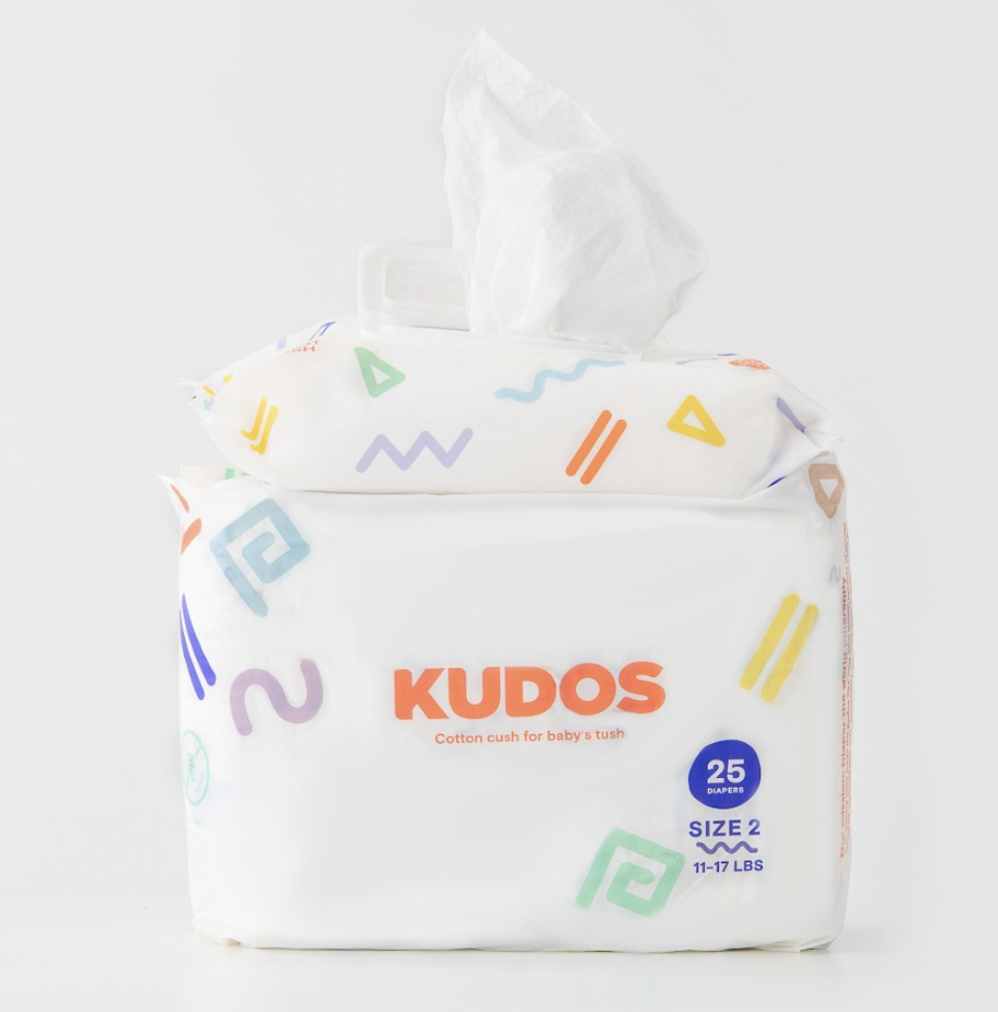 kudos pack of diapers and wipes on white background