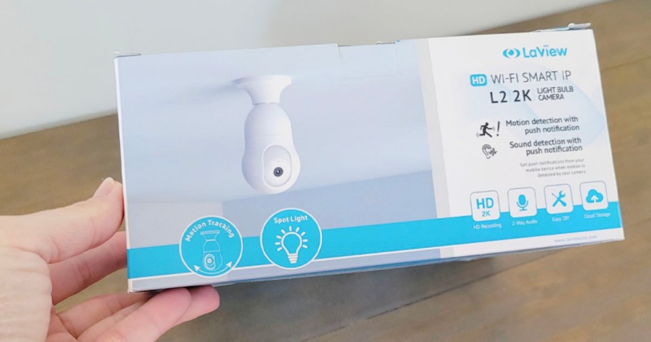 hand holding laview smart bulb box on table