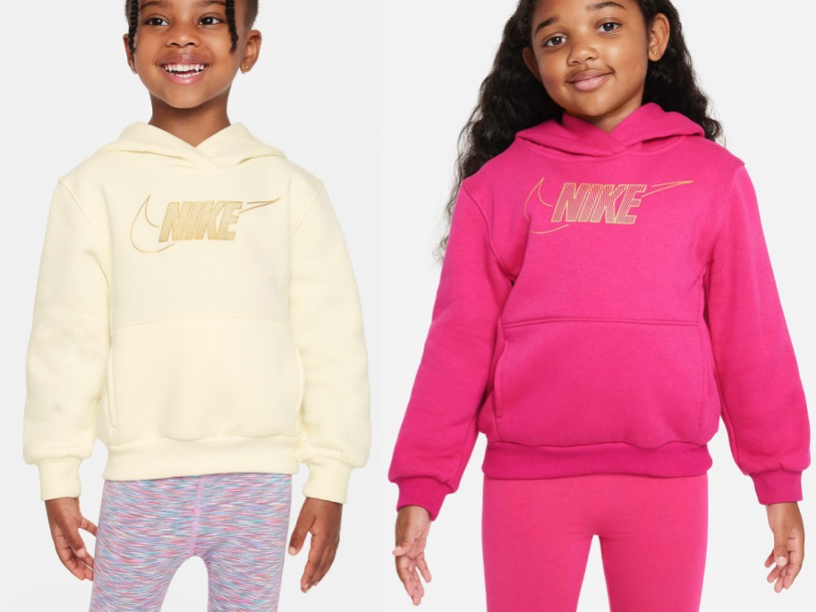 little and big kid wearing nike sweaters in yellow and pink