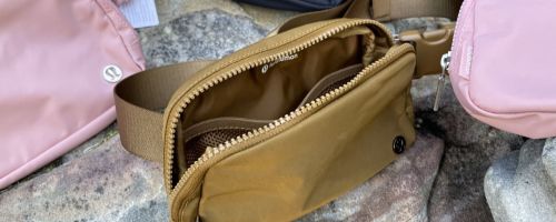 lululemon belt bags with one unzipped to expose the inside