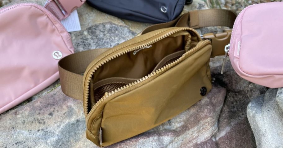 lululemon belt bags with one unzipped to expose the inside