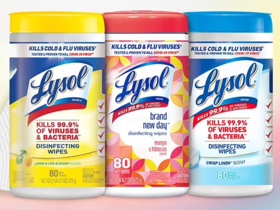 stock photo of 3 lysol wipe containers on pink background