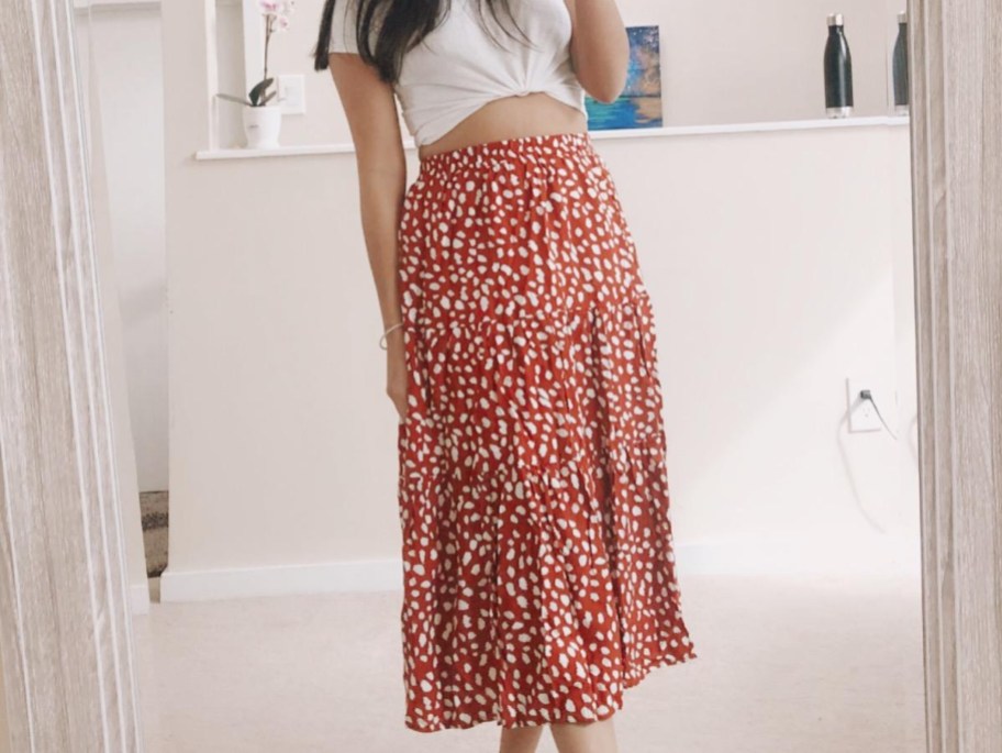 woman wearing red dotted skirt