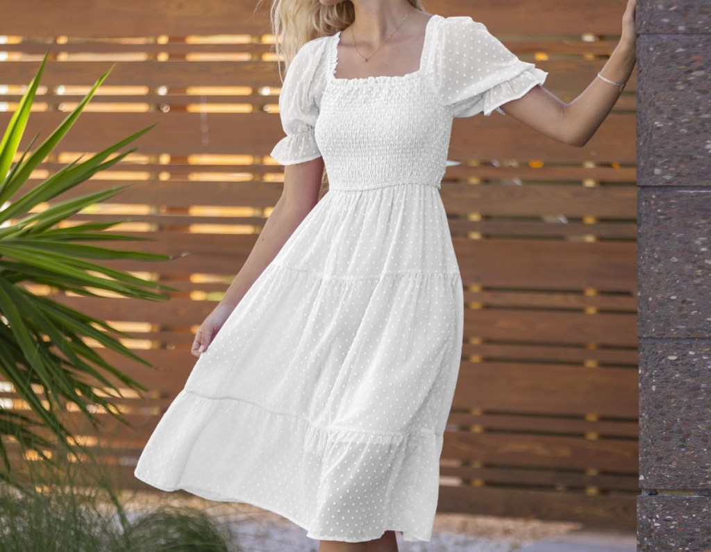 woman wearing white dress