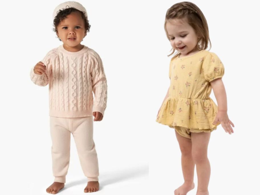 toddler girl wearing a cream color cable knit sweater and pants and matching hat and another toddler girl wearing a yellow floral ruffle romper