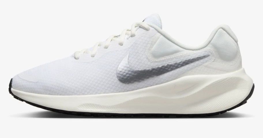 white, pale blue and silver women's Nike running shoe