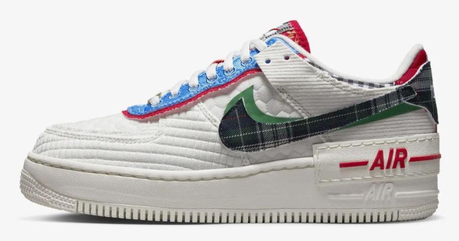 women's Nike Air Force 1 shoe in white with red, blue and green accents