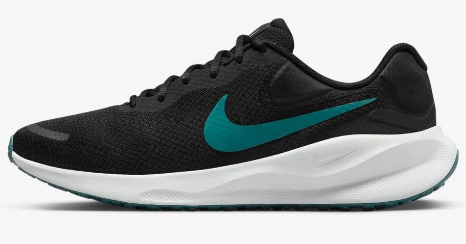 black, white and teal green men's Nike running shoe