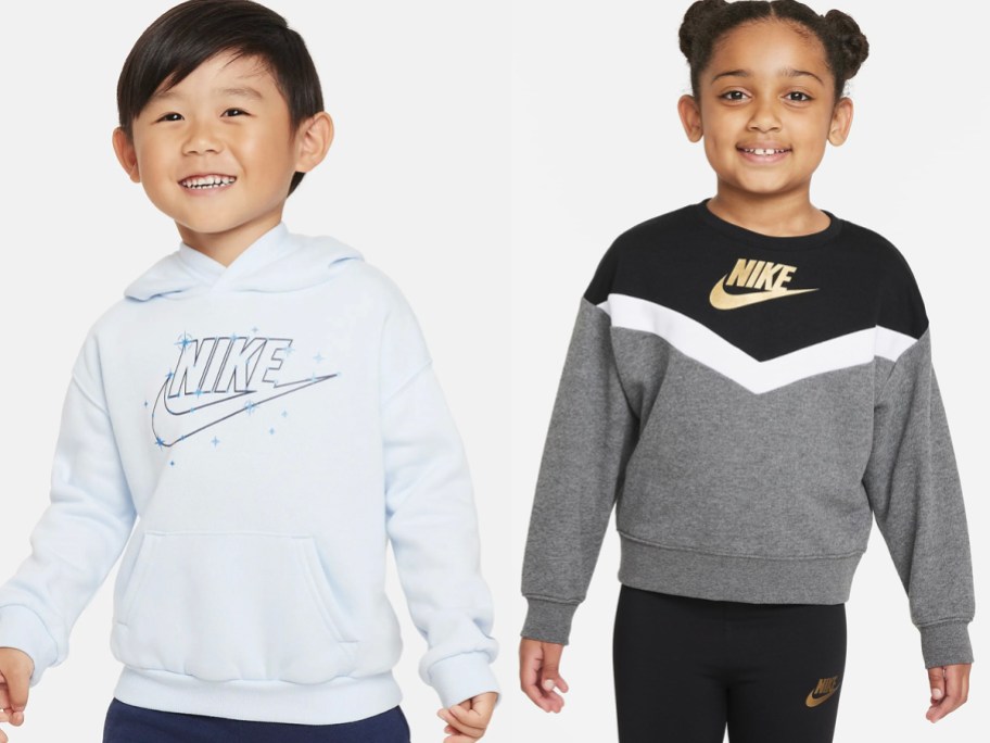 toddler boy and girl wearing light blue and gray and black Nike hoodies