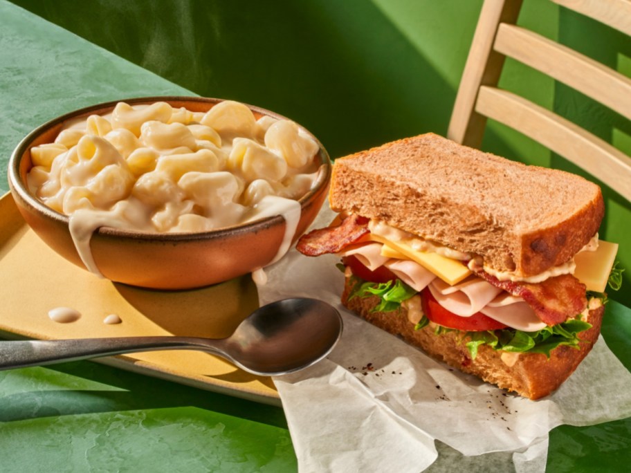 soup and sandwich on green tablecloth
