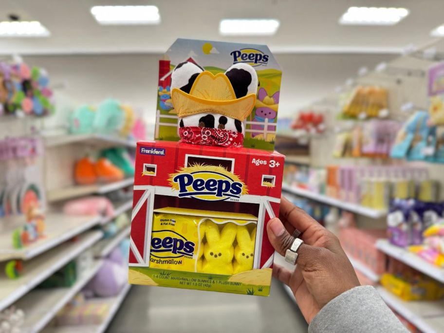 hand holding a Peeps Bunny Farm House Gift Set at Target