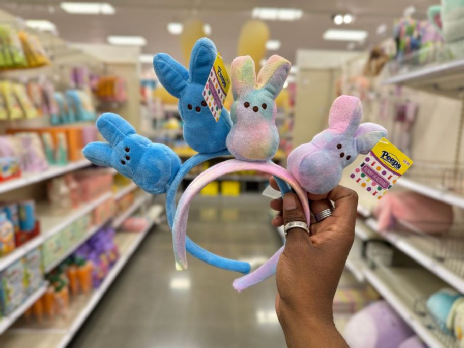 hand holding Peeps Headbands with Peeps Bunnies on them in different colors