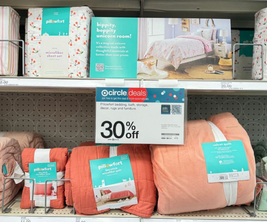 pillowfort comforters and sheets on a store shelf