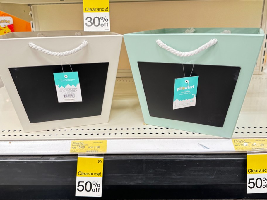 white and teal storage bins on shelf in target
