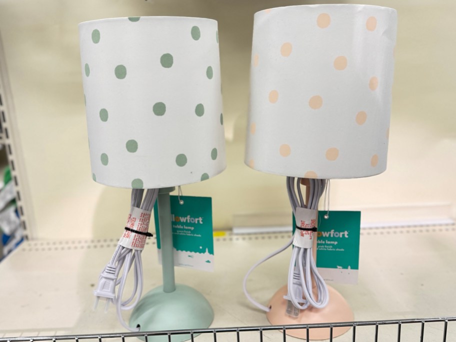 teal and peach lamps on shelf