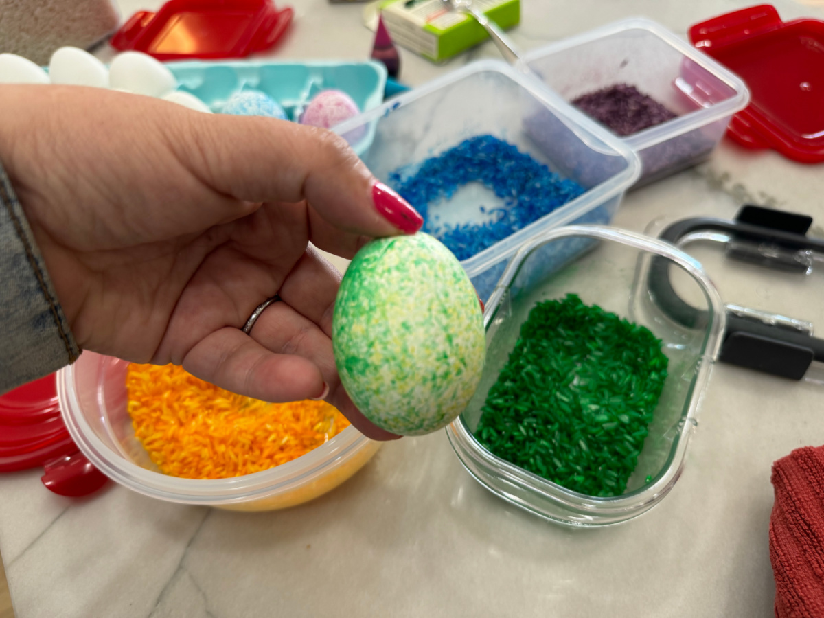 showing yellow and green speckled eggs