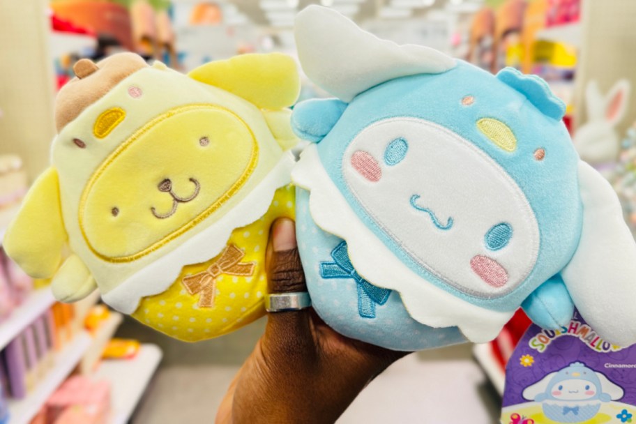 hand. holding hello kitty easter squishmallows