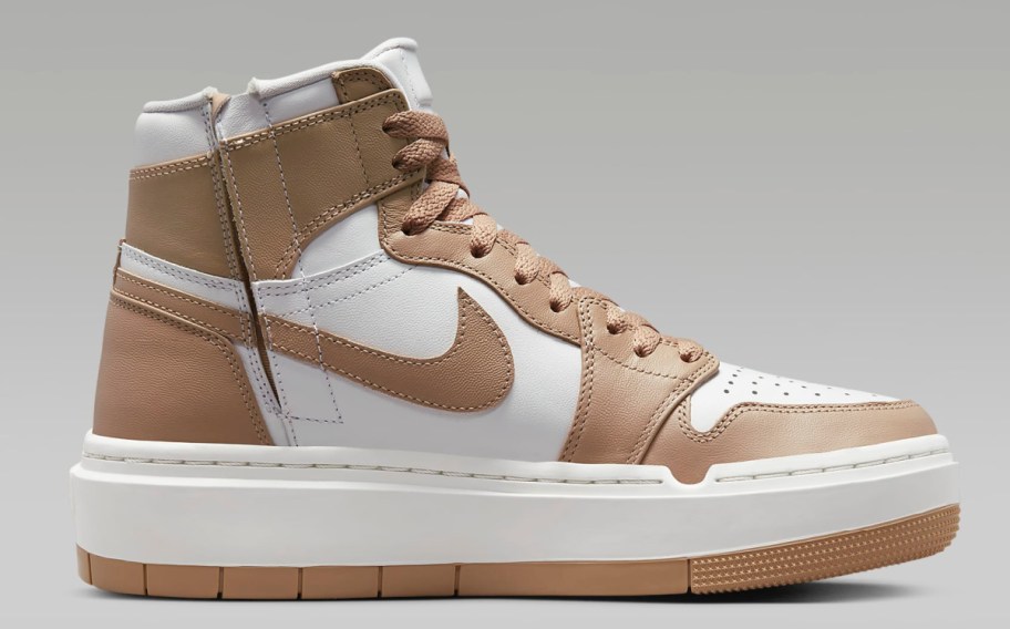 stock image of Air Jordan 1 Elevate High Women’s Shoes in gold and white