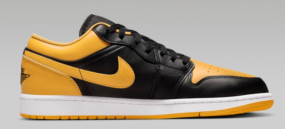 stock image of Air Jordan 1 Low Men's Shoes in yellow and black