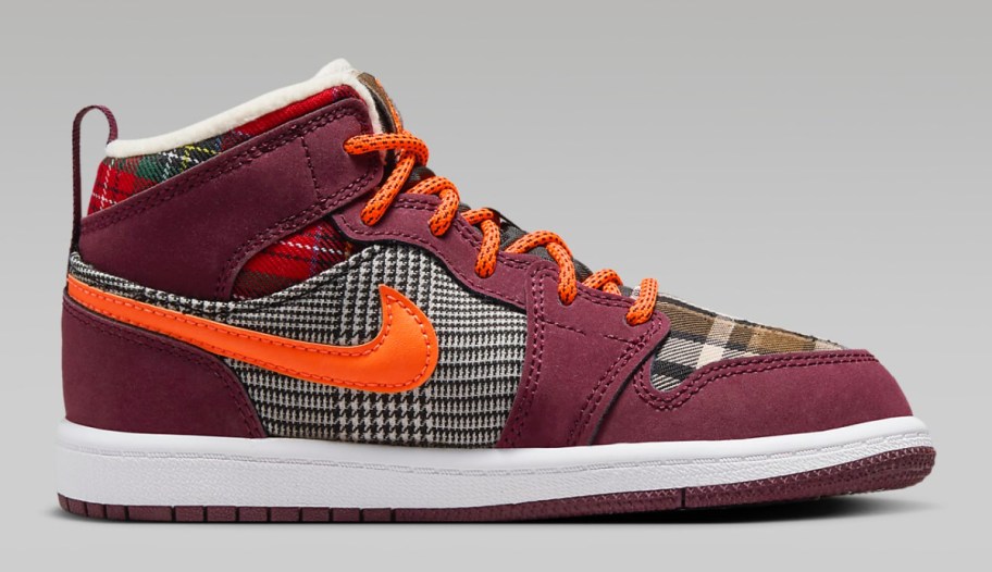 stock image of Jordan 1 Mid SE Little Kids Shoes with patterns