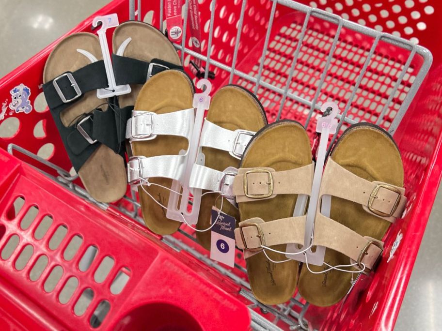 3 pair of women's footbed double buckle slide sandals in a Target cart