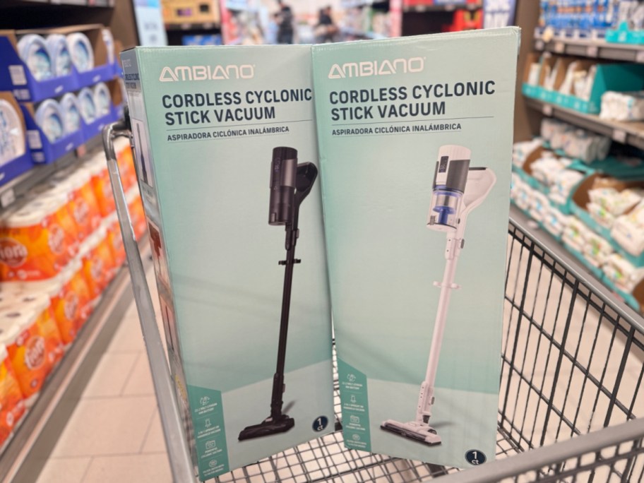 two cordless stick vacuums inside of an ALDIS cart