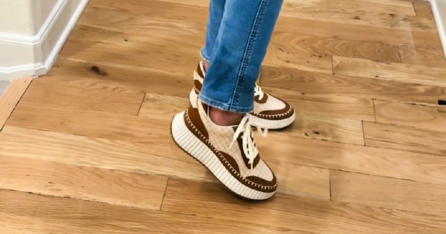 woman wearing jeans and tan universal thread Persephone Sneakers