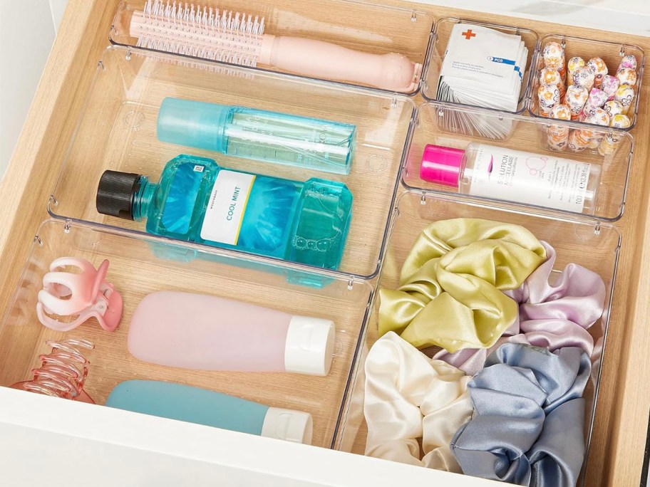 clear organizers with beauty products inside drawer