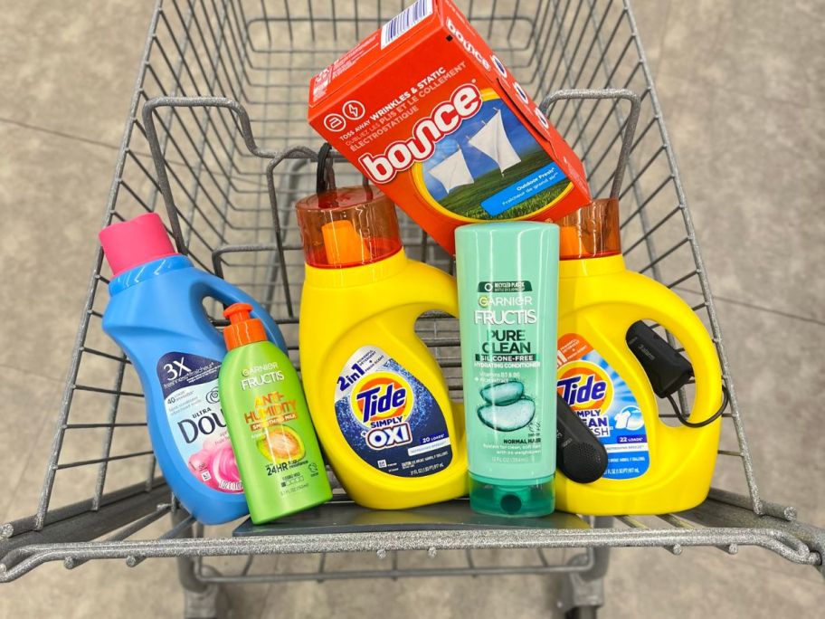 cart with tide, bounce, downy and garnier products in it
