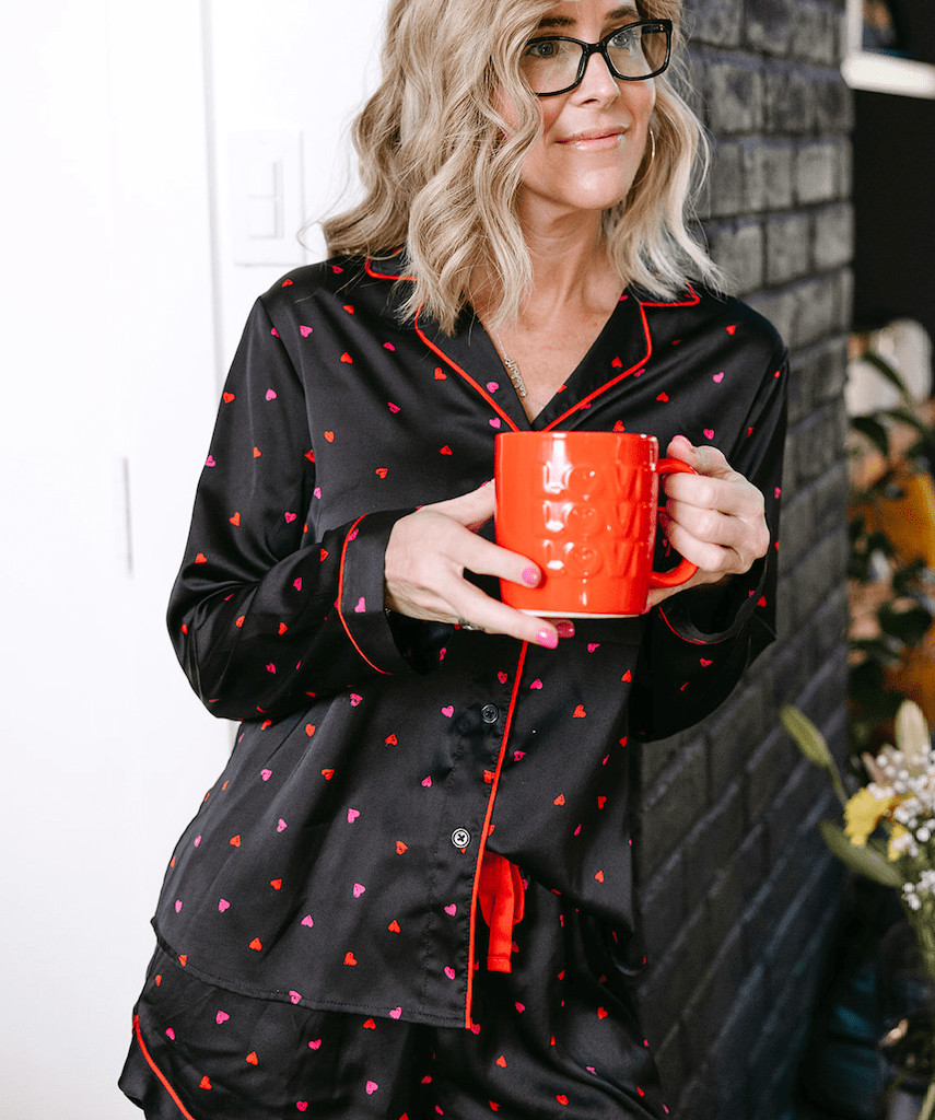 woman wearing heart pajamas