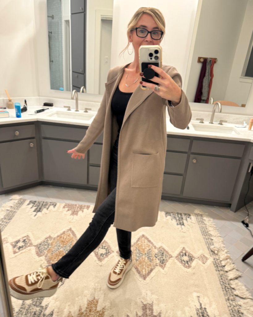 woman wearing coatigan in bathroom 