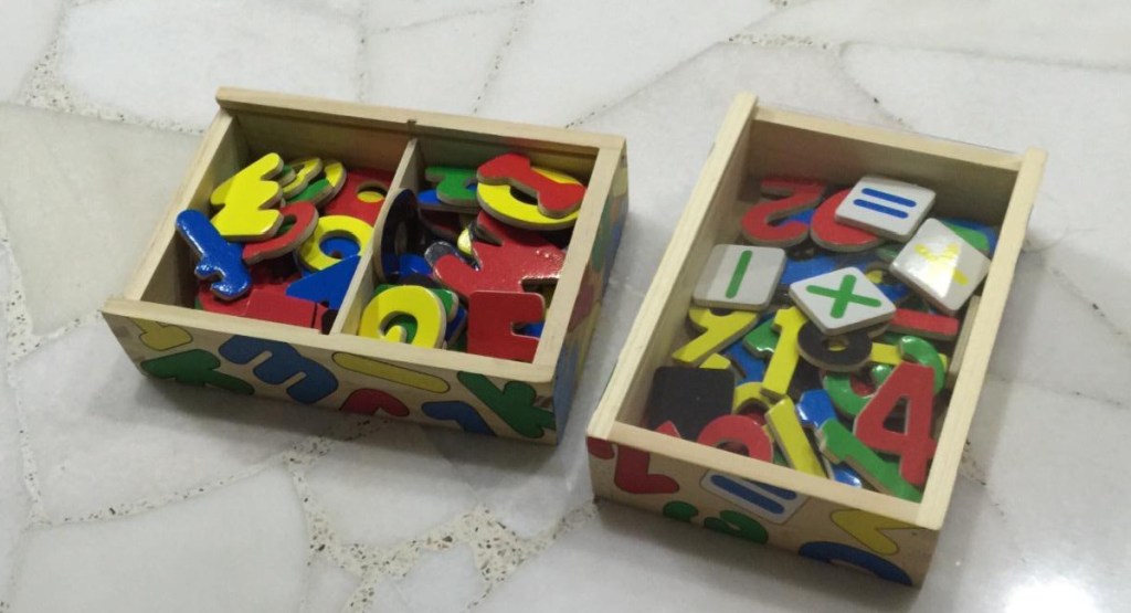 wooden box with letters inside of it