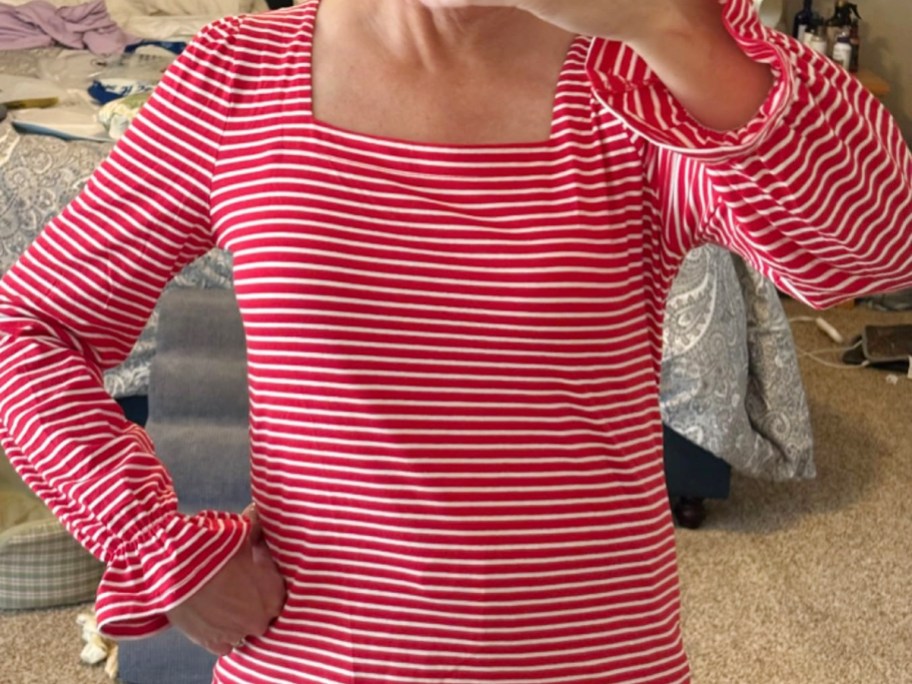 woman wearing red and white striped shirt 